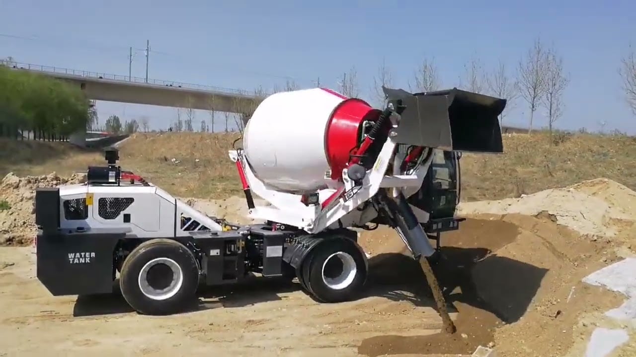 STLTG self loading="lazy" mixer truck on worksite - Super easy and effective for construction projects!